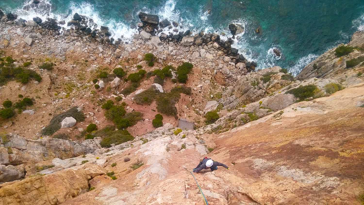 Multi-pitch climbing Masua cliff, Sardinia